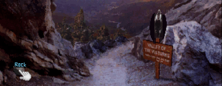 A screenshot of the opening screen of Return to Zork. A vulture sits on a sign welcoming you to the Valley of the Vultures. The cursor hovers over a rock.